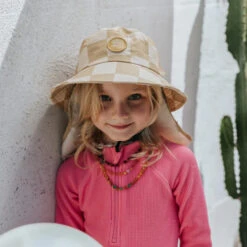 Plow Surf Co. | Beach Beige | Plow Surf Hat | Surfing Hat | Beach + Water Activity Headwear | 11 Plow Surf Co. | Beach Beige | Plow Surf Hat | Surfing Hat | Beach + Water Activity Headwear | -Surf Board Pro Store Buy Plow Surf Co Beach Beige Surfing Hat With Chin Strap Girls 35957.1692945031