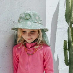 Plow Surf Co. | Gumnut Green Floral | Plow Surf Hat | Surfing Hat | Beach + Water Activity Headwear | -Surf Board Pro Store Buy Plow Surf Co Gumnut Green Floral Surfing Hat With Chin Strap Kids 13081.1692943756