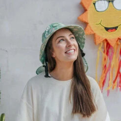 Plow Surf Co. | Gumnut Green Floral | Plow Surf Hat | Surfing Hat | Beach + Water Activity Headwear | -Surf Board Pro Store Buy Plow Surf Co Gumnut Green Floral Surfing Hat With Chin Strap Ladies 87634.1692943660